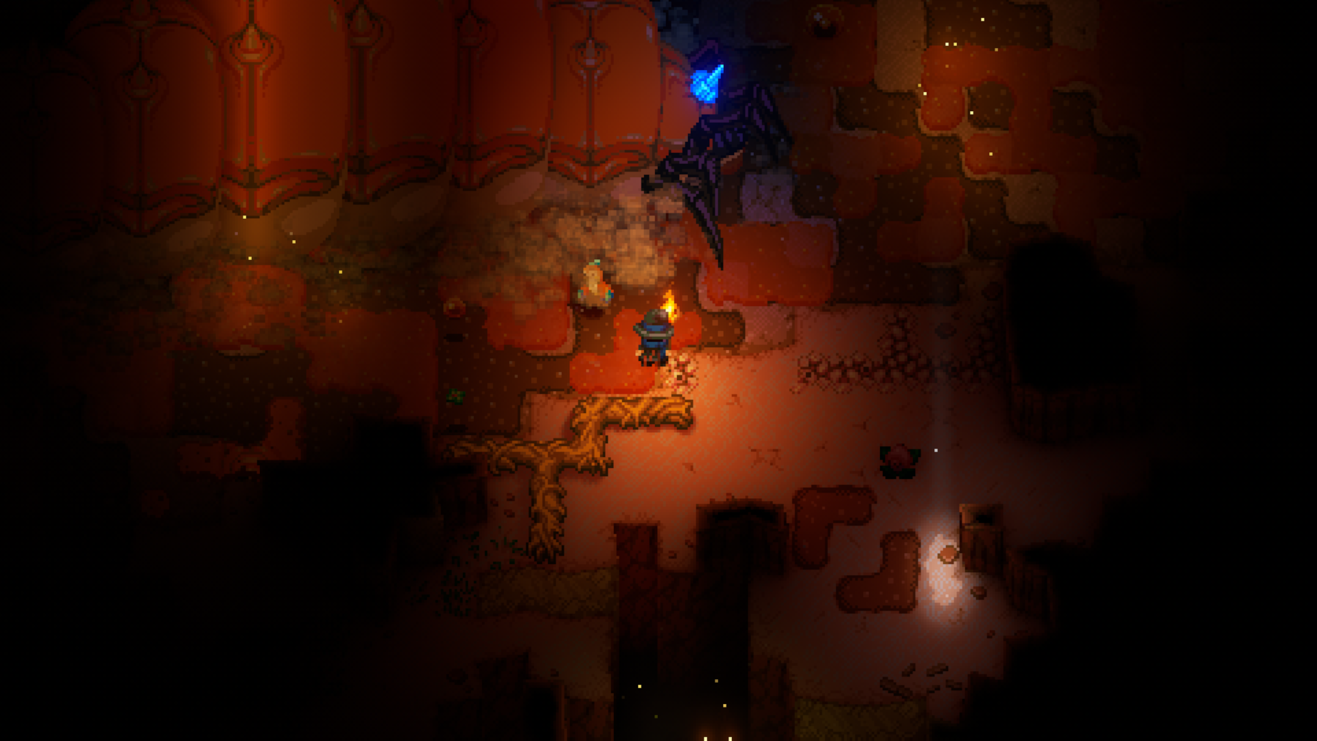 A screenshot from Core Keeper showing a player character facing the giant, segmented worm-like boss, Ghorm the Devourer, in a dark underground tunnel.