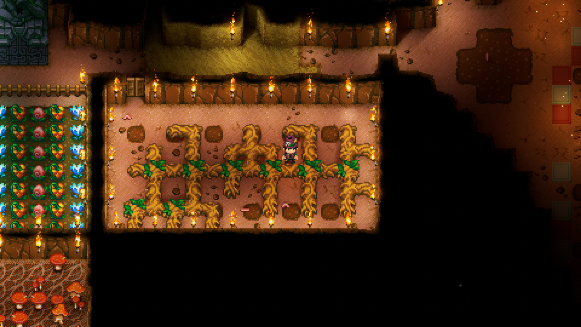 An overhead view in Core Keeper shows a player standing near a dedicated root farm, where thick roots are growing in a contained dirt room.