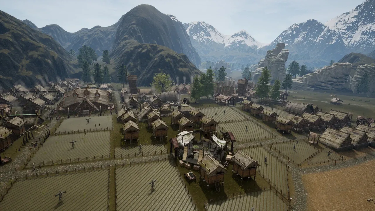 An aerial view of a sprawling Viking village in Land of the Vikings, nestled in a valley with snow-capped mountains in the background. The settlement features numerous thatched-roof longhouses, organized farm fields, and small character models, all rendered in a realistic art style.